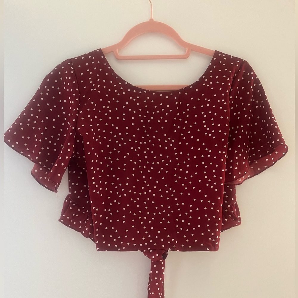 Red dotted tie-back blouse